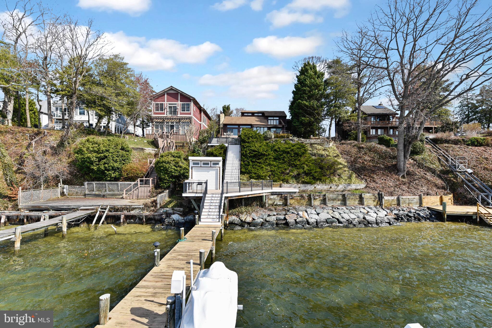 245 Long Point Road Crownsville, MD 21032 - Photo 6 of 53 a view of house with swimming pool yard and outdoor seating