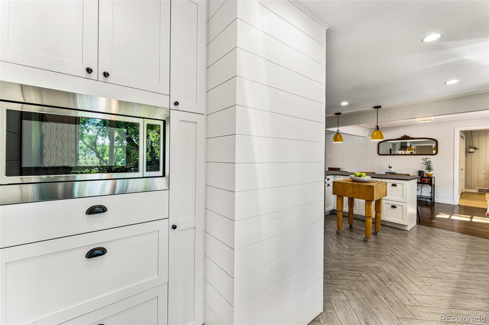 3885 Cody Street Wheat Ridge, CO 80033 - Photo 17 of 40 a view of kitchen with furniture and window