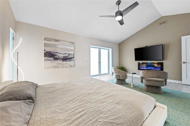 a outdoor space with lots of tables a garden view and chairs