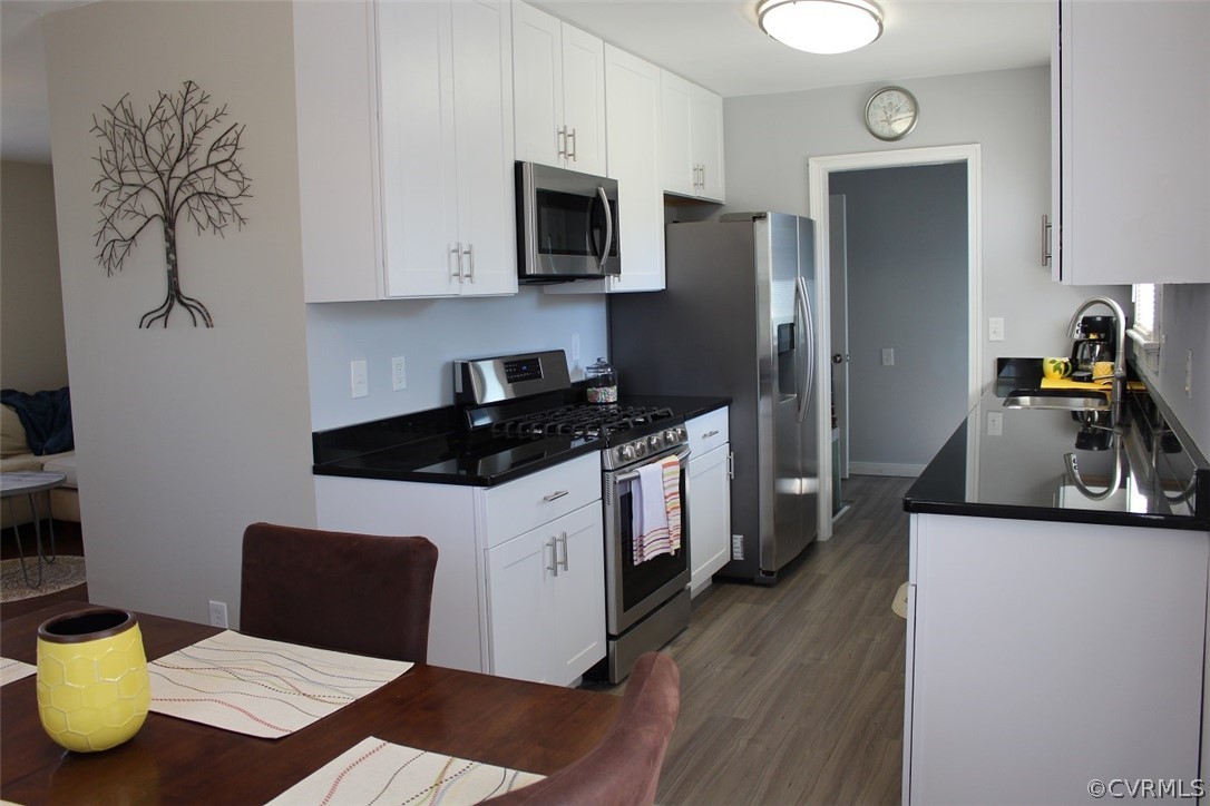 2711 Elora Road Richmond, VA 23223 - Photo 10 of 24 Completely renovated Kitchen with new vinyl plank