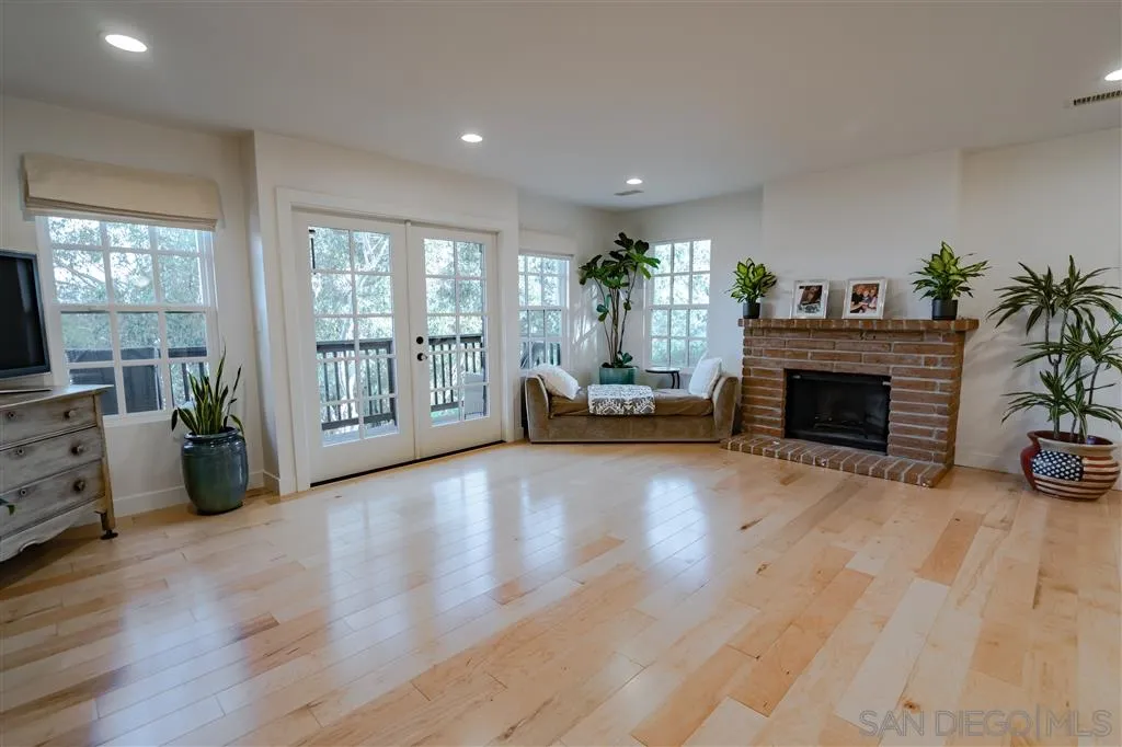 132 Candy Lane Encinitas, CA 92024 - Photo 4 of 24 a living room with furniture and a fireplace