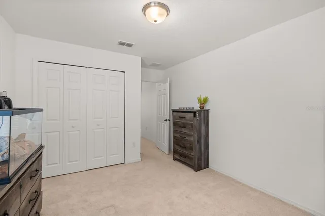 a view of an outdoor sitting area with furniture and garden