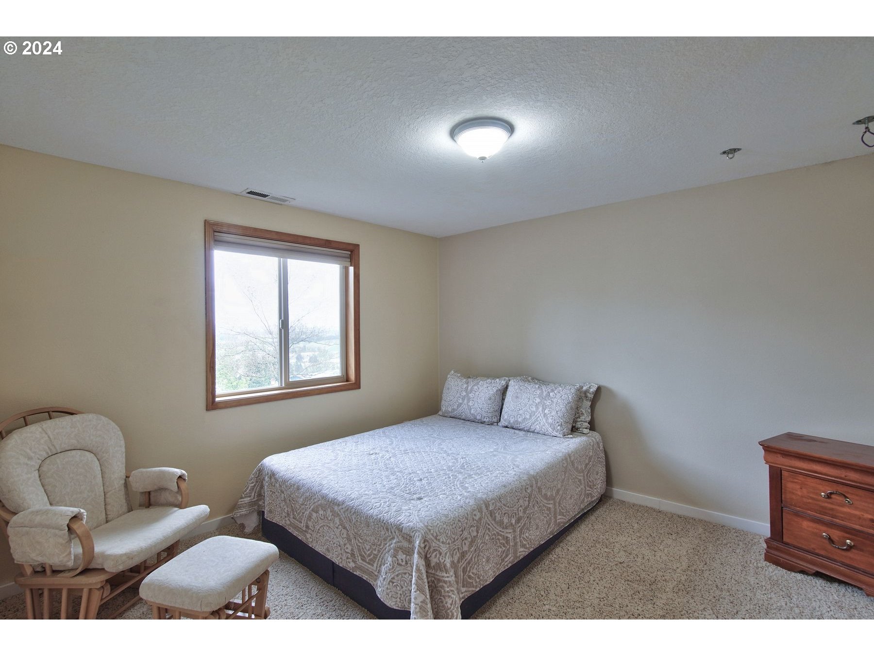 7255 Southwest Hergert Road Cornelius, OR 97113 - Photo 36 of 47 a bedroom with a bed and a window