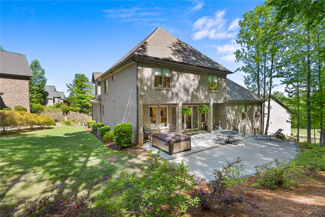 140 Turnberry Road Anderson, SC 29621 - Photo 33 of 44 Relax on the spacious patio or enjoy the surrounding nature.