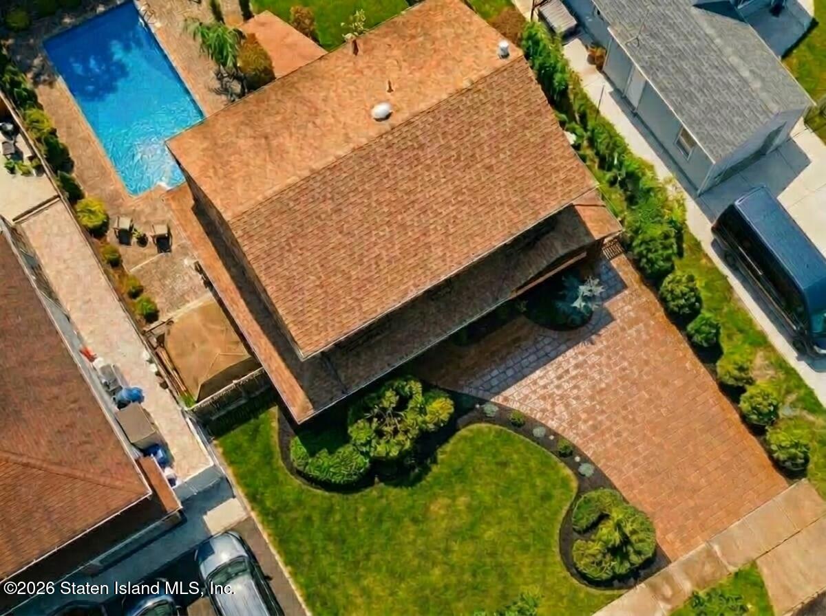 3569 Richmond Road Staten Island, NY 10306 - Photo 2 of 3 Light_brown_driveway_wet_pavers_20260428