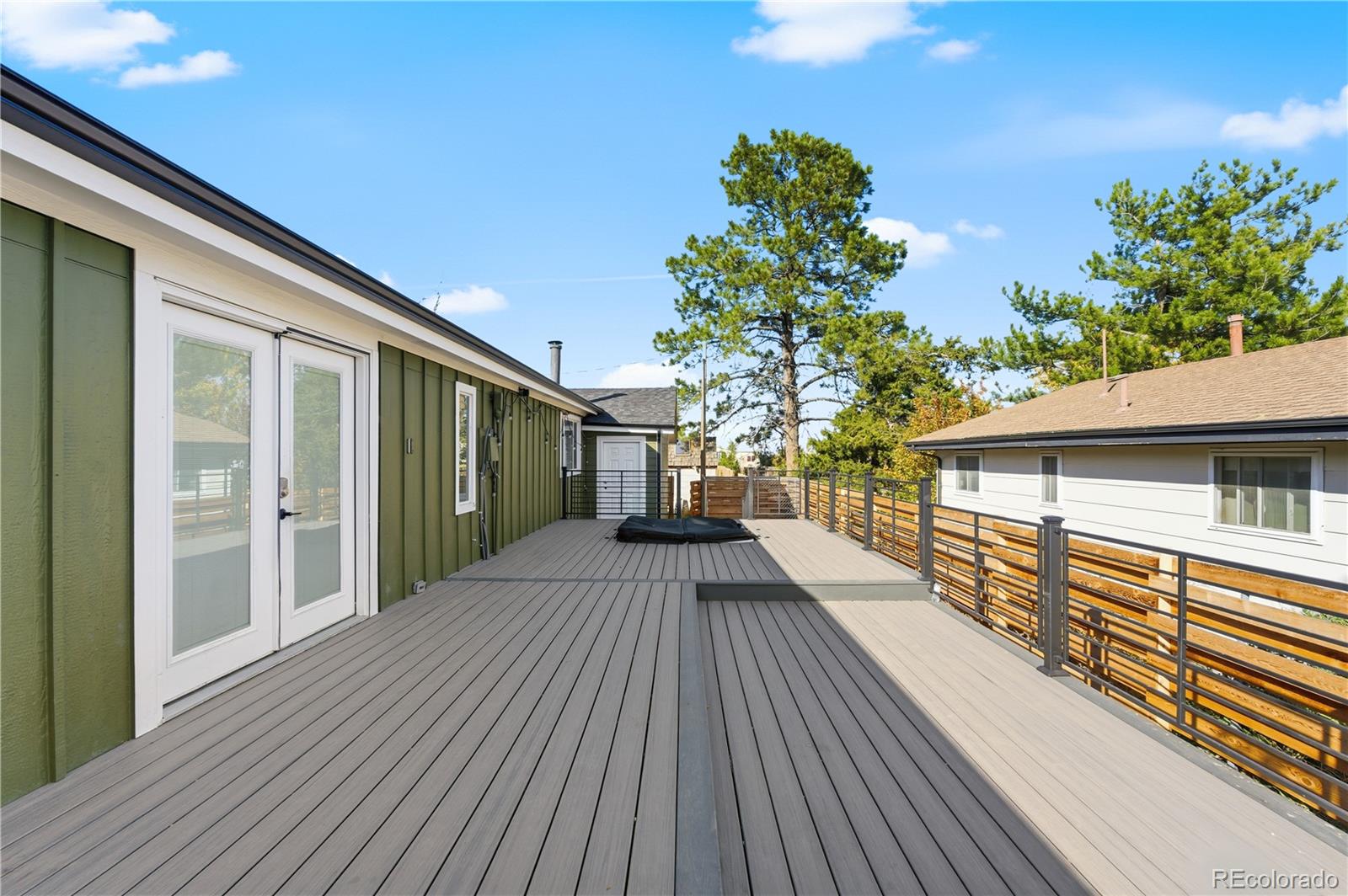 610 6th Street Bennett, CO 80102 - Photo 11 of 34 a view of a house with a deck