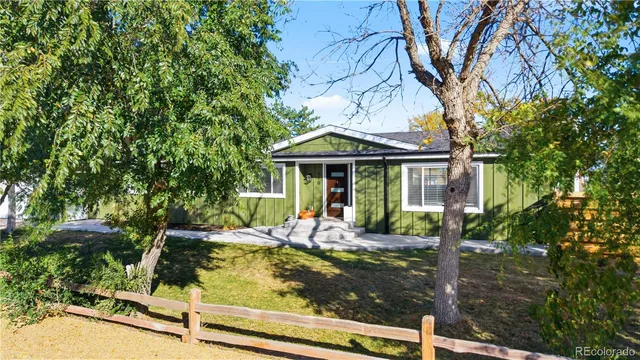 an aerial view of multiple houses with yard