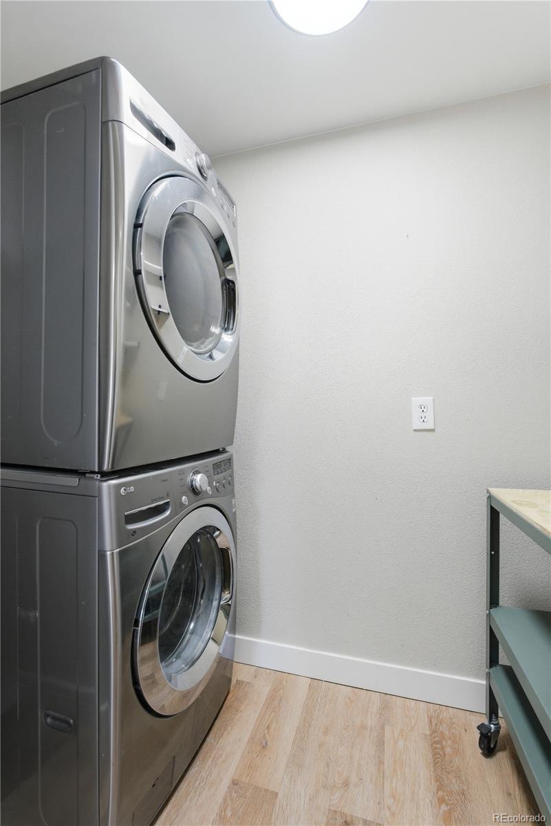 610 6th Street Bennett, CO 80102 - Photo 32 of 34 a utility room with dryer and washer