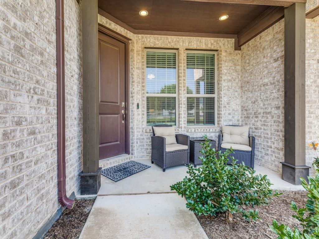 5944 Bursey Road Watauga, TX 76148 - Photo 3 of 25 a garden view with a seating space