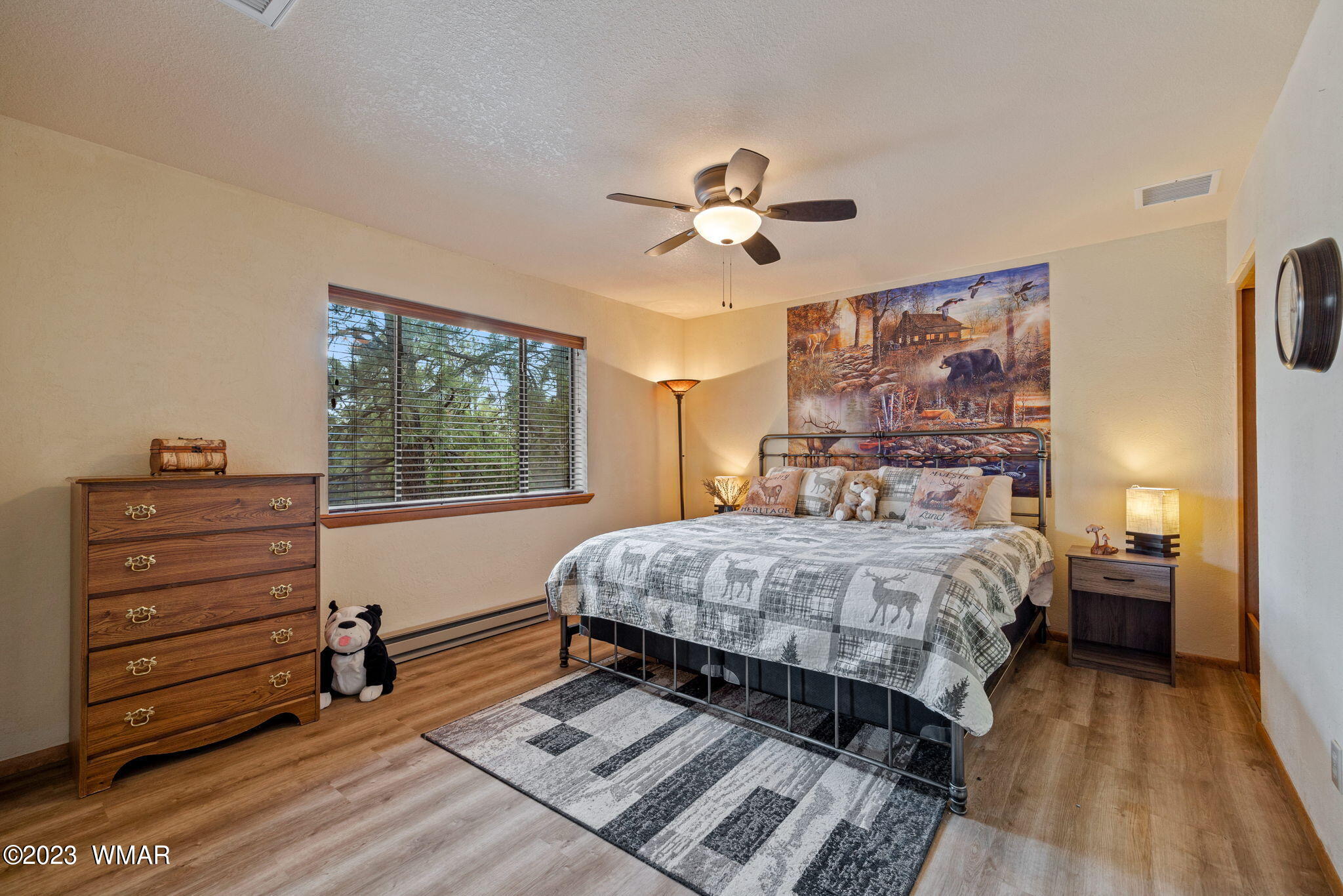 2276 Lindberg Road Overgaard, AZ 85933 - Photo 11 of 34 a bedroom with a bed and a window