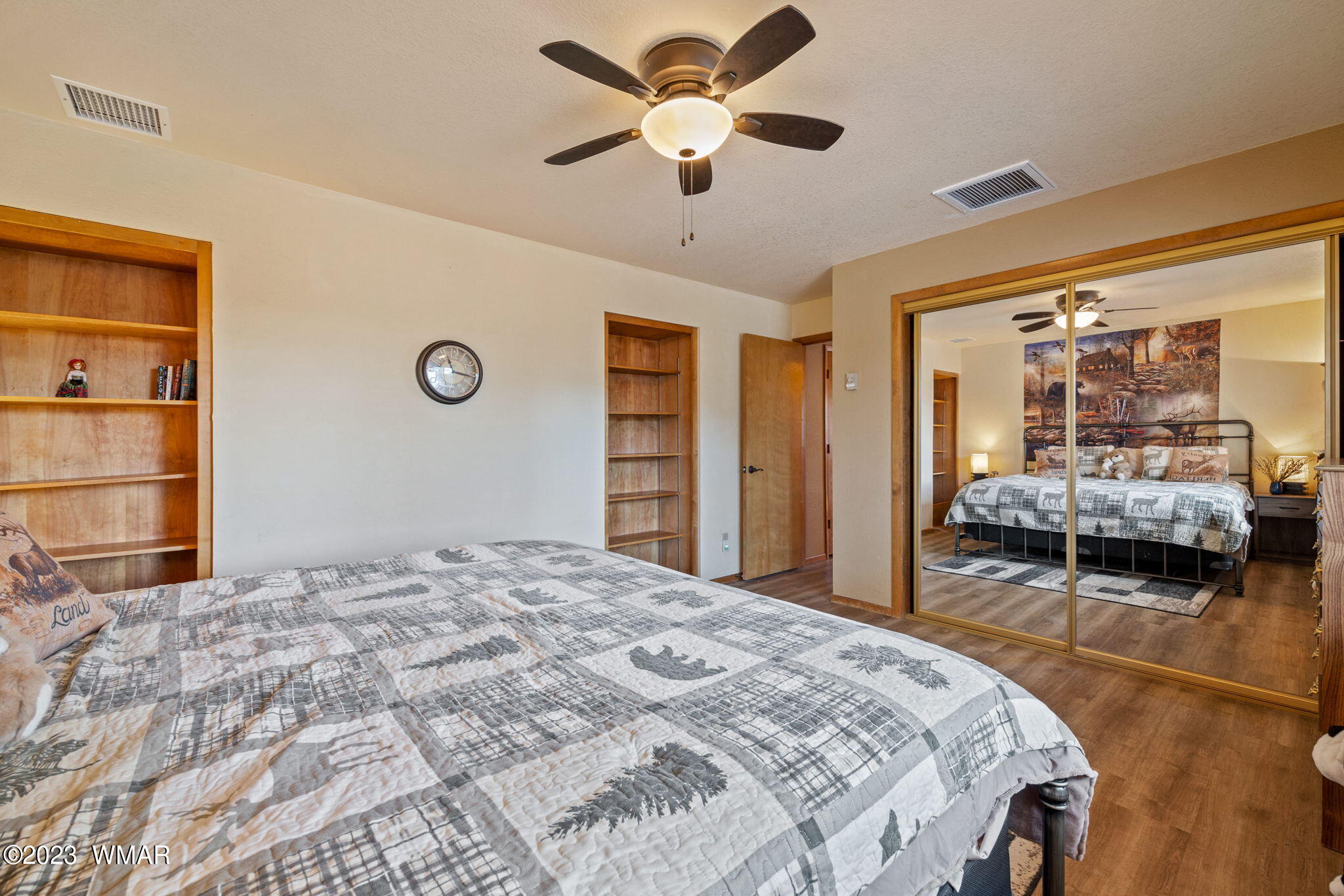 2276 Lindberg Road Overgaard, AZ 85933 - Photo 12 of 34 a bedroom with a bed and a large window