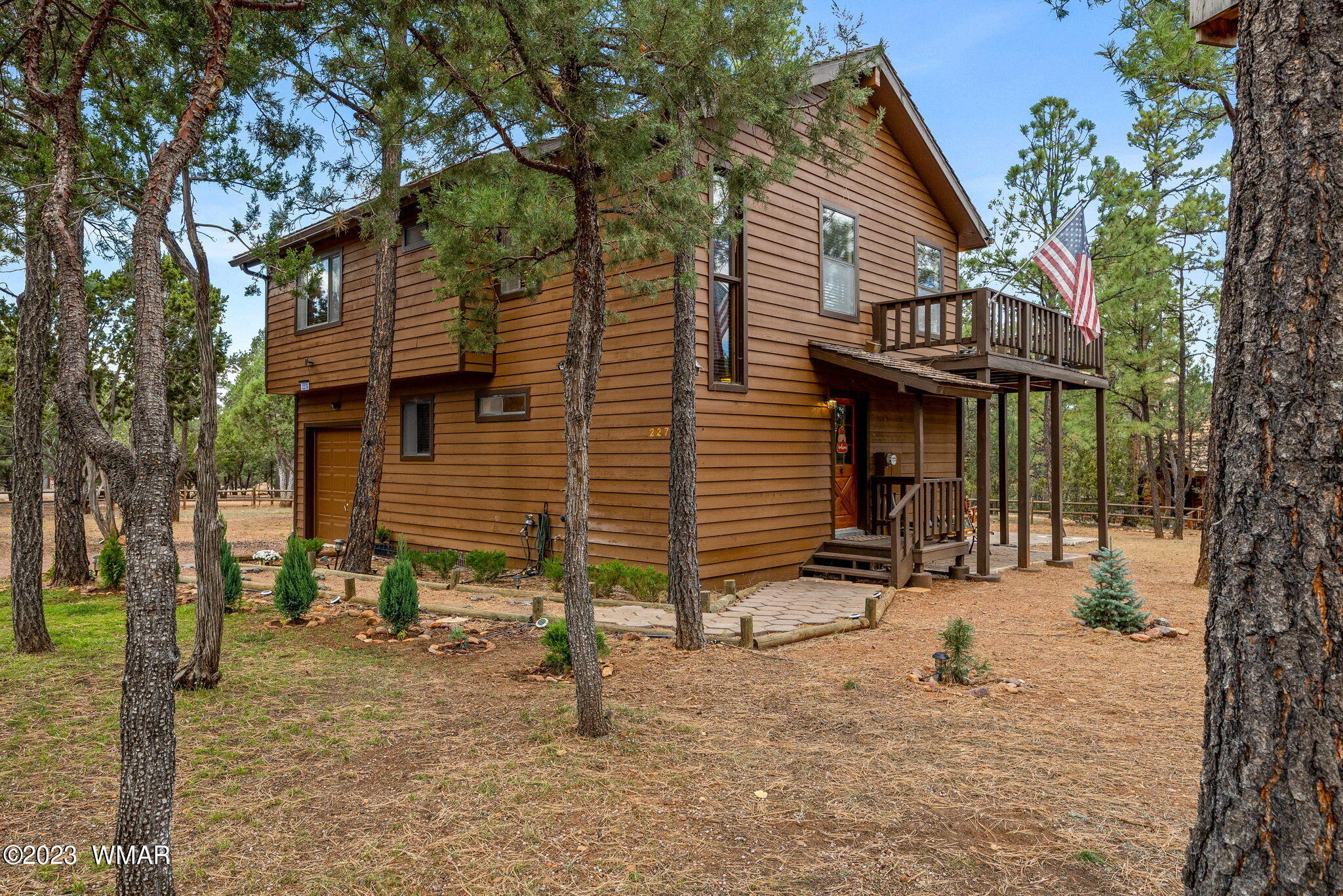 2276 Lindberg Road Overgaard, AZ 85933 - Photo 19 of 34 a view of a house with a yard