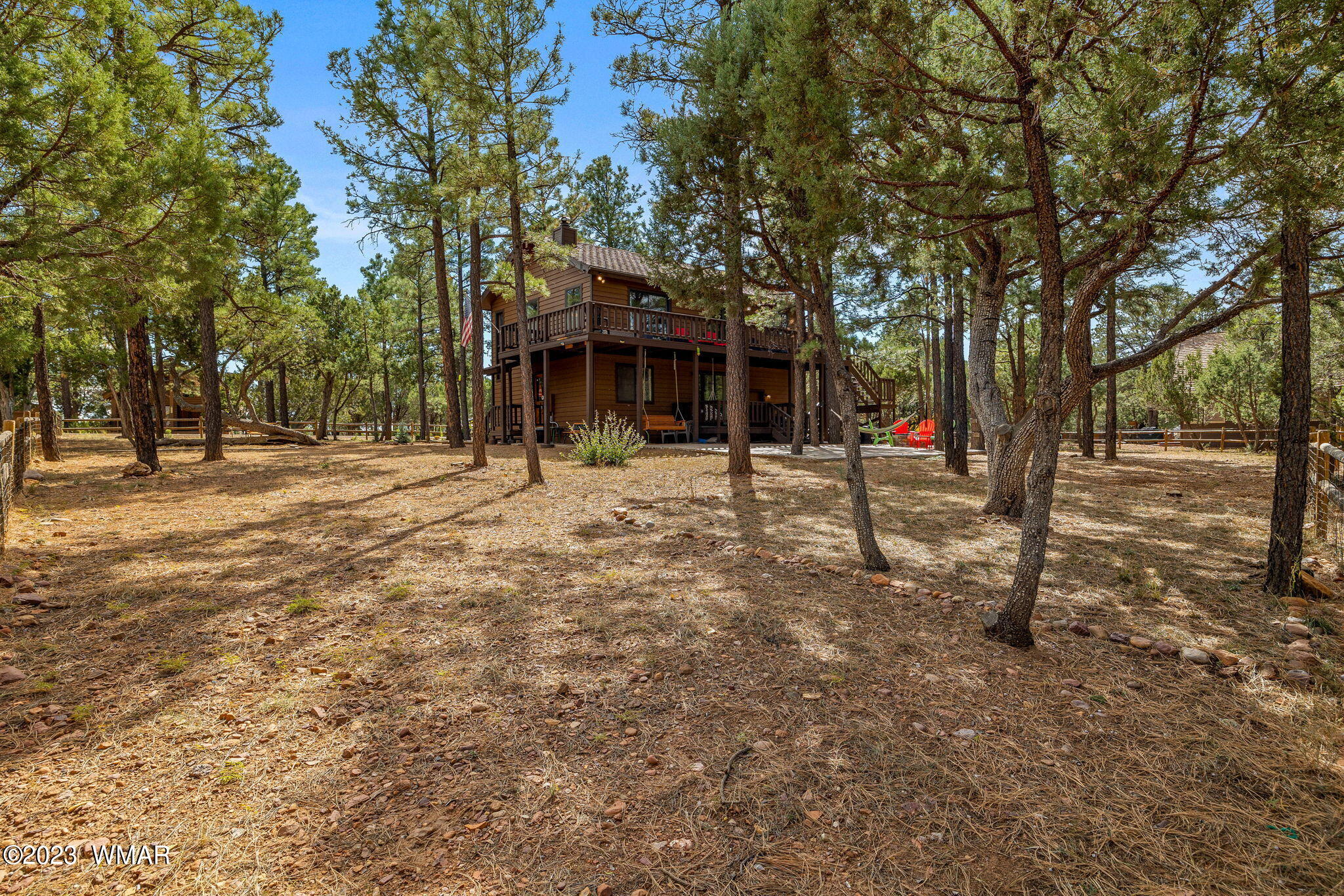 2276 Lindberg Road Overgaard, AZ 85933 - Photo 23 of 34 a outdoor space with lots of trees