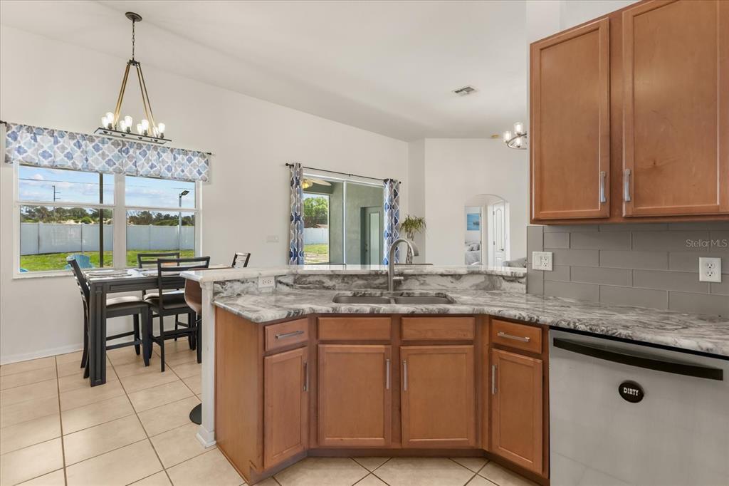 2309 Wolf Ridge Lane Mount Dora, FL 32757 - Photo 12 of 36 a kitchen with a sink and cabinets