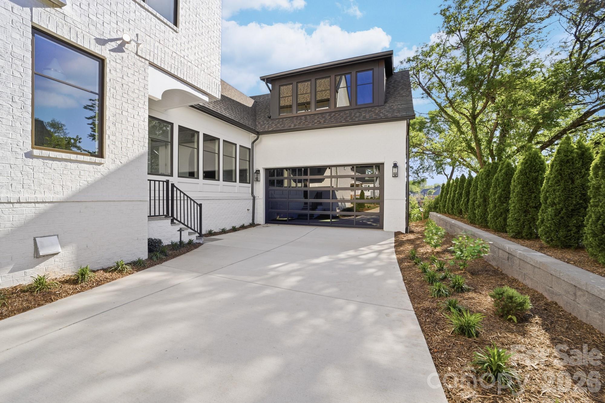 216 Walnut Street Davidson, NC 28036 - Photo 2 of 48 a view of a house with a yard