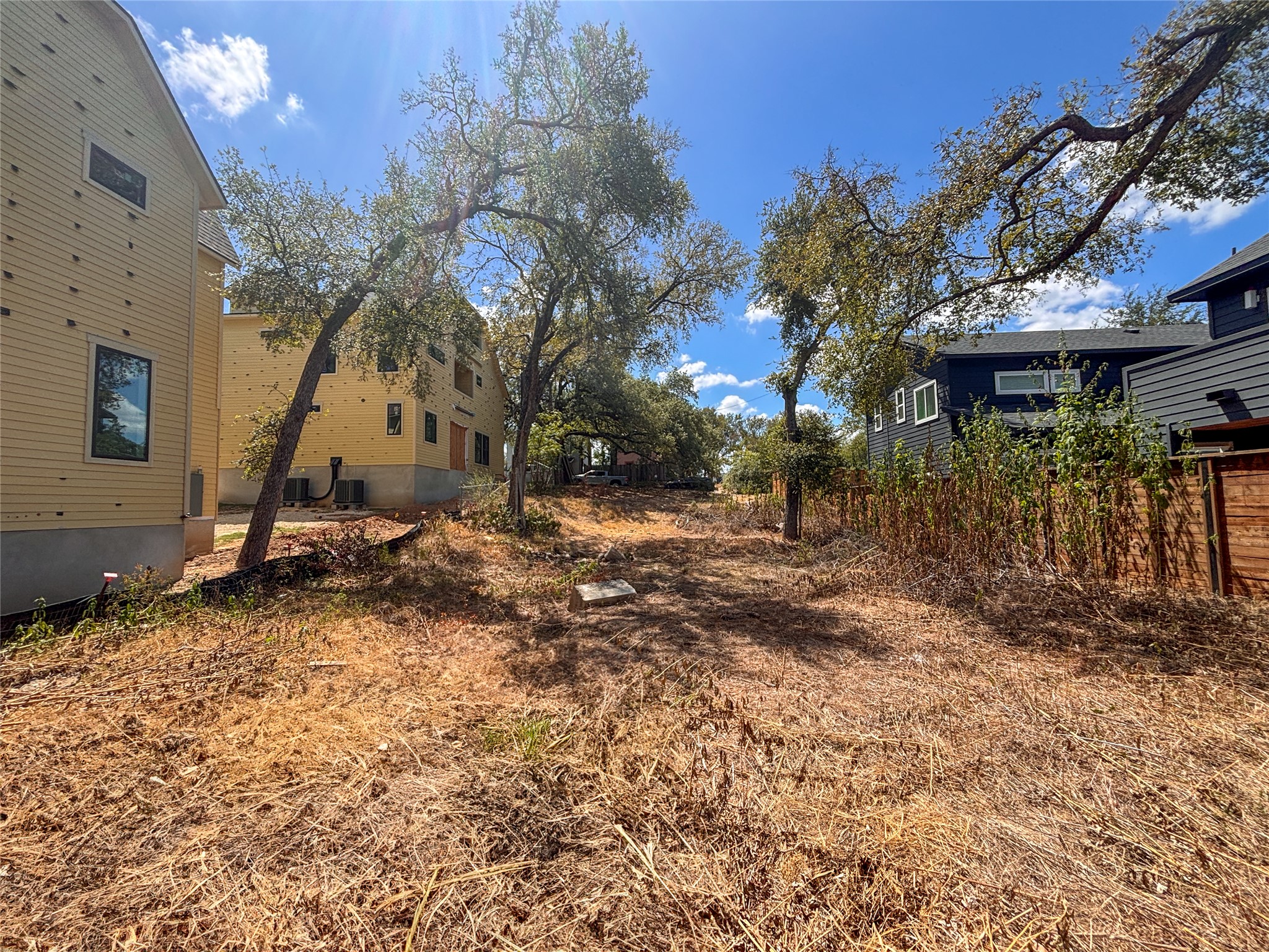 4602 Santa Anna Street Austin, TX 78721 - Photo 8 of 14 Mature trees shade a spacious building lot nestled between existing neighborhood homes.