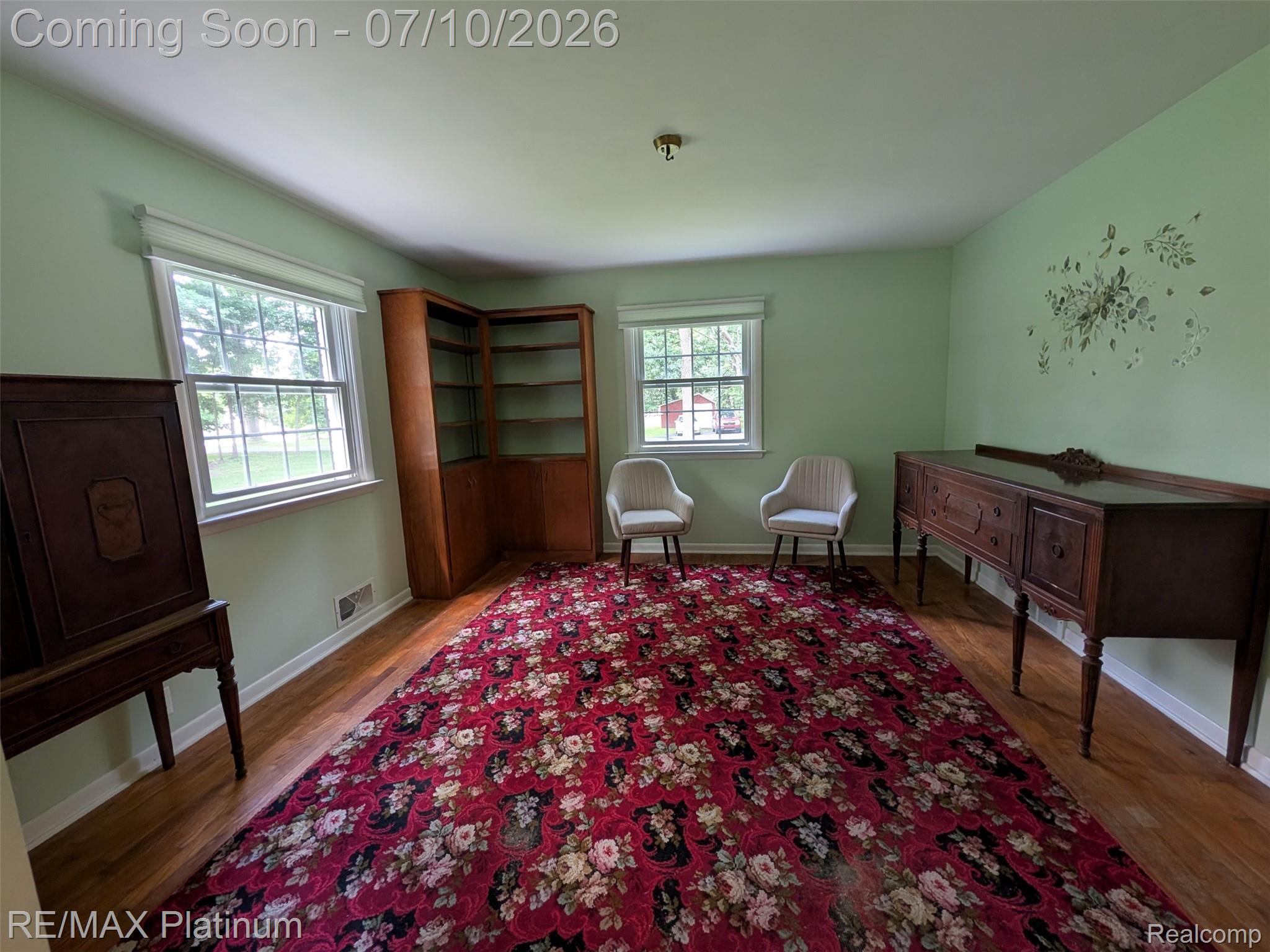 1430 Dauner Road Fenton, MI 48430 - Photo 3 of 41 Natural light and hardwood flooring highlight this room just off the kitchen.