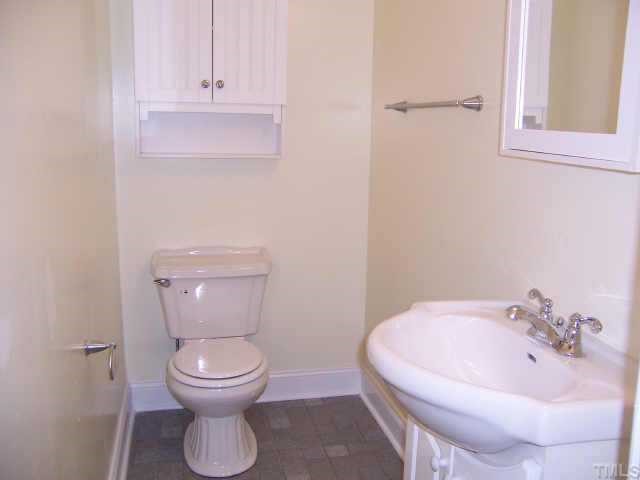 4161 Virgilina Road Roxboro, NC 27574 - Photo 8 of 12 Master bath has new sink, vanity, and toilet