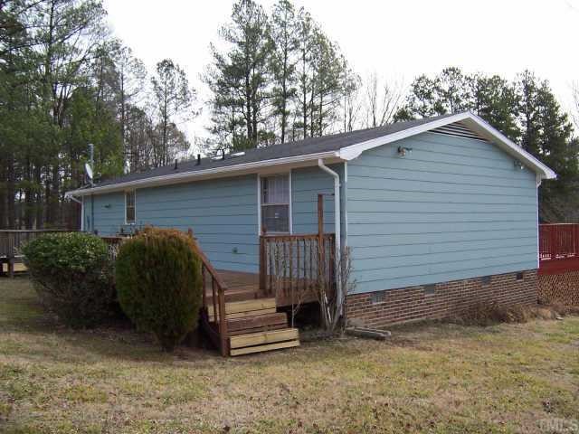 4161 Virgilina Road Roxboro, NC 27574 - Photo 10 of 12 Rear deck is great for a cookout