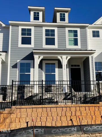 a front view of a building with glass windows