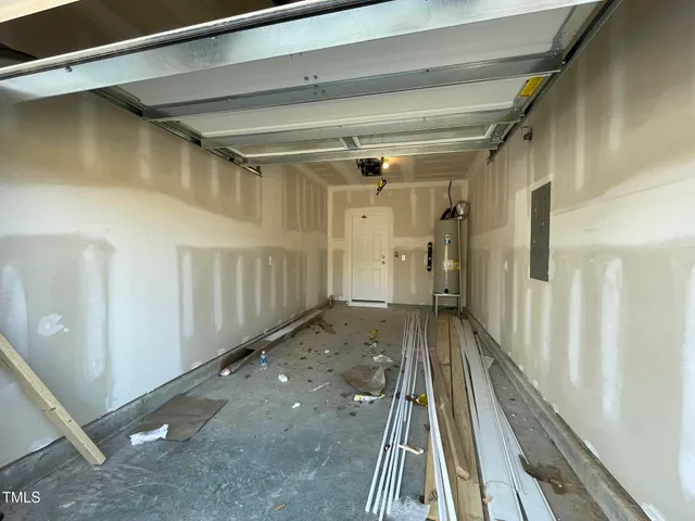 a black and white photo of a kitchen