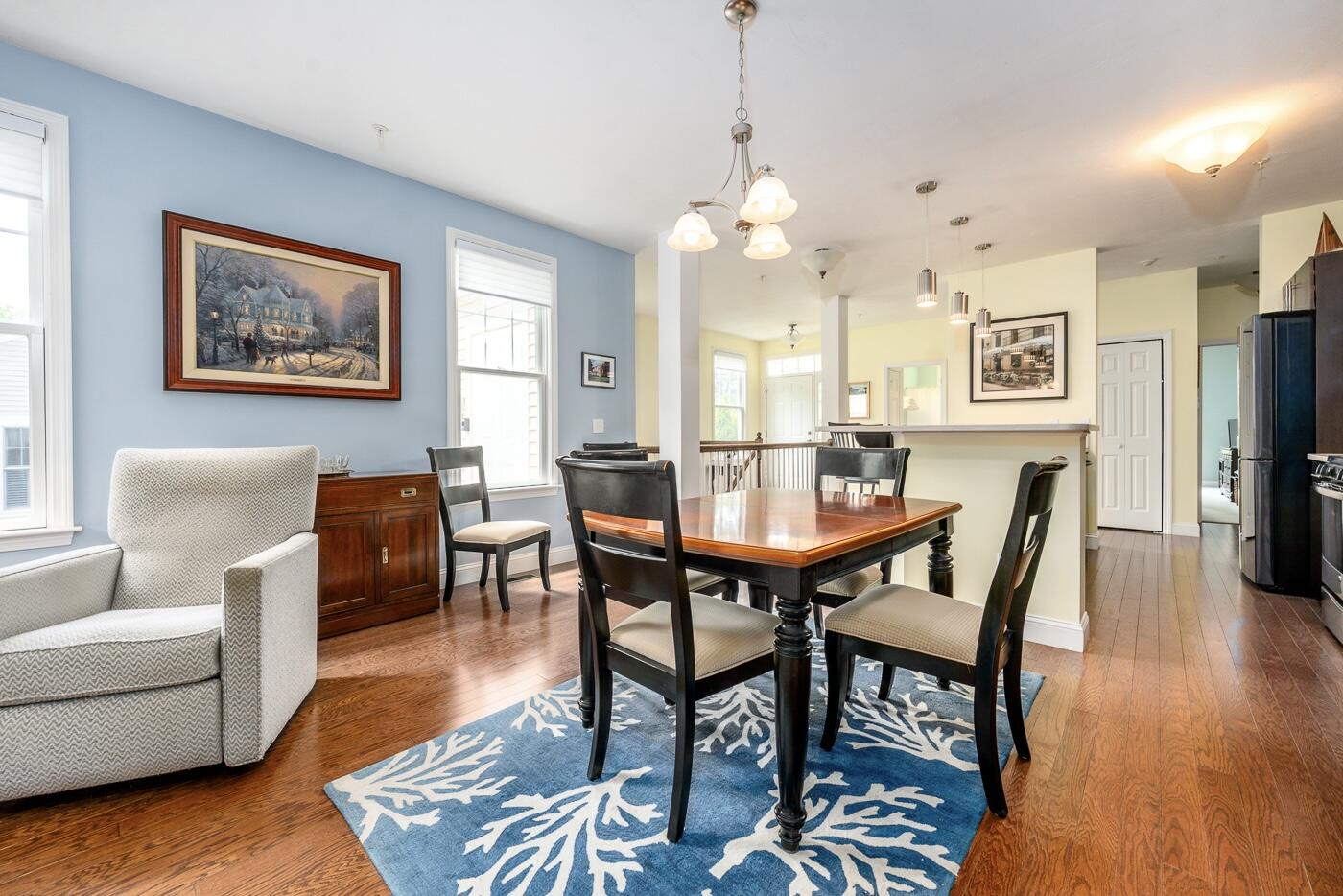 72 Grey Hawk Drive Mashpee, MA 02649 - Photo 8 of 28 a view of a a dining room with furniture window and wooden floor