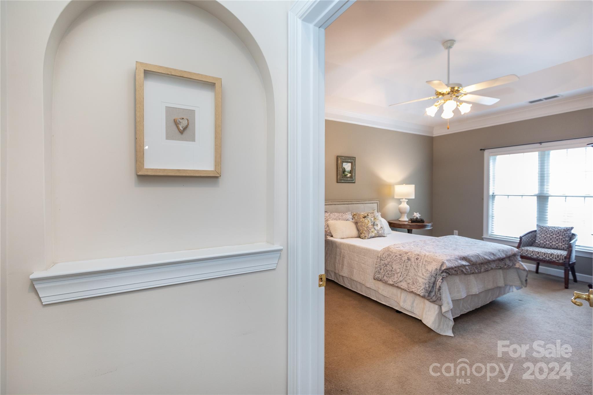 8368 Windsor Ridge Drive Charlotte, NC 28277 - Photo 14 of 28 a bedroom with a bed couch and a window