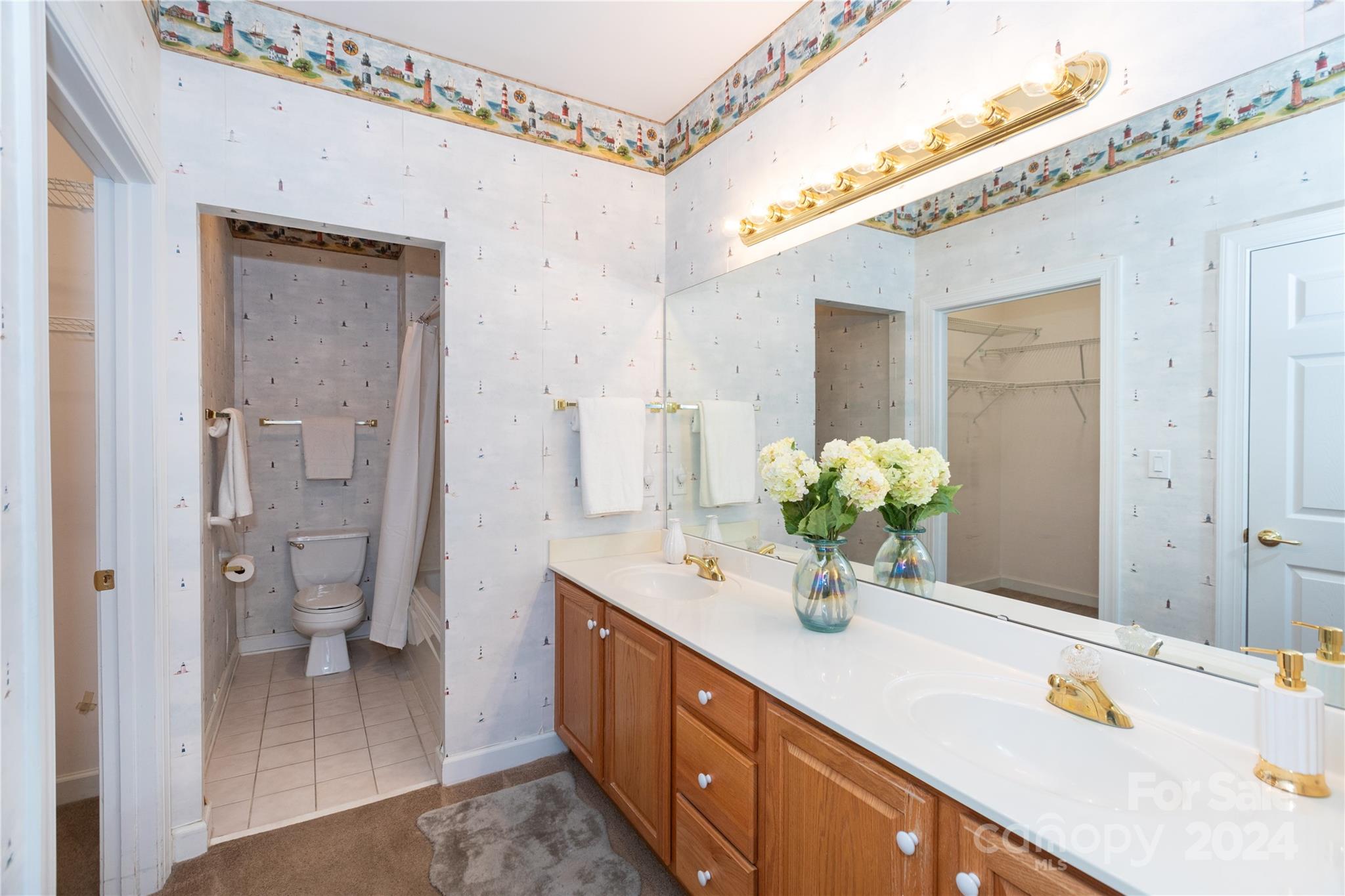 8368 Windsor Ridge Drive Charlotte, NC 28277 - Photo 17 of 28 a bathroom with a double vanity sink mirror and shower