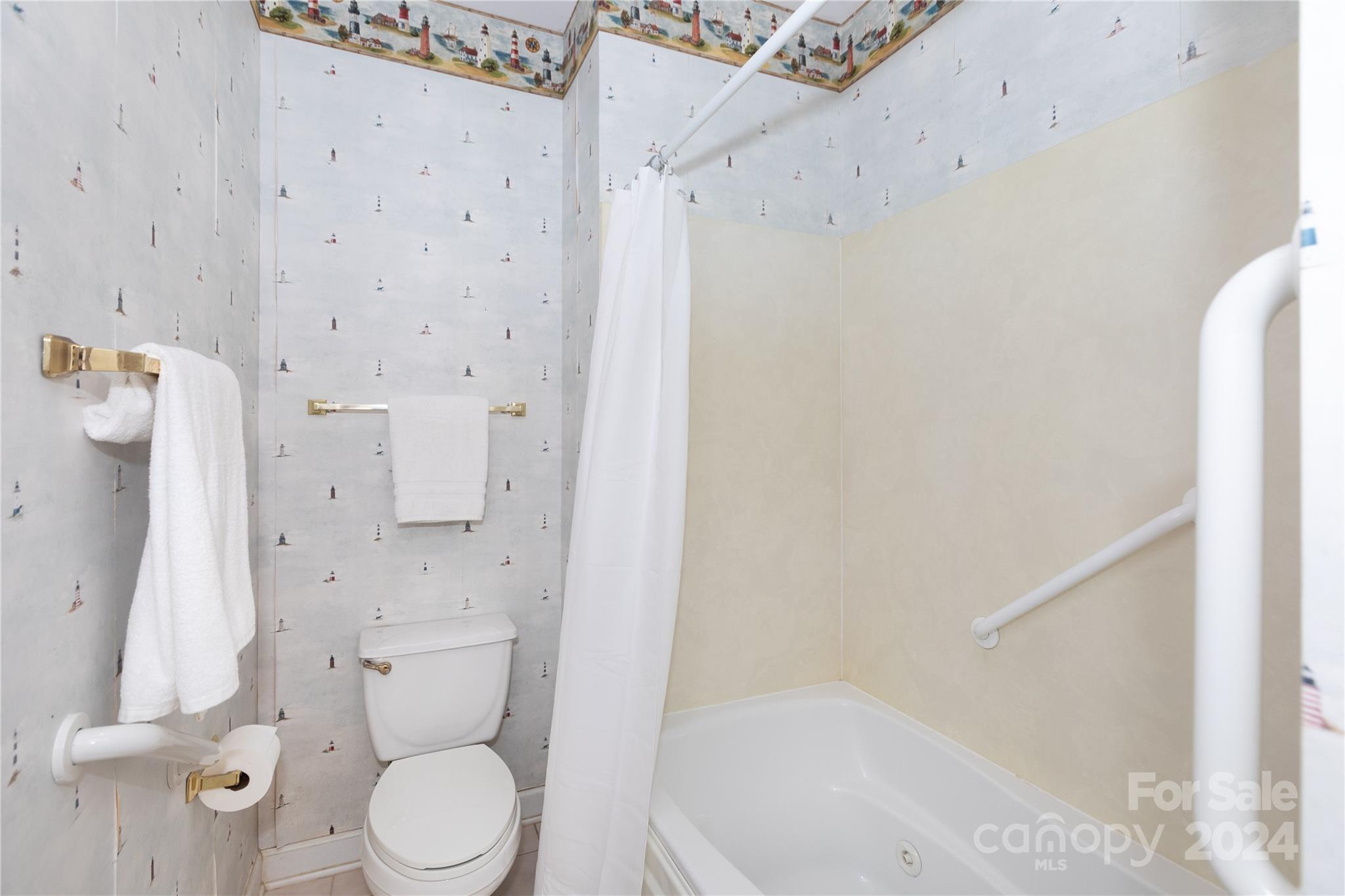 8368 Windsor Ridge Drive Charlotte, NC 28277 - Photo 18 of 28 a white toilet sitting next to a bath tub shower