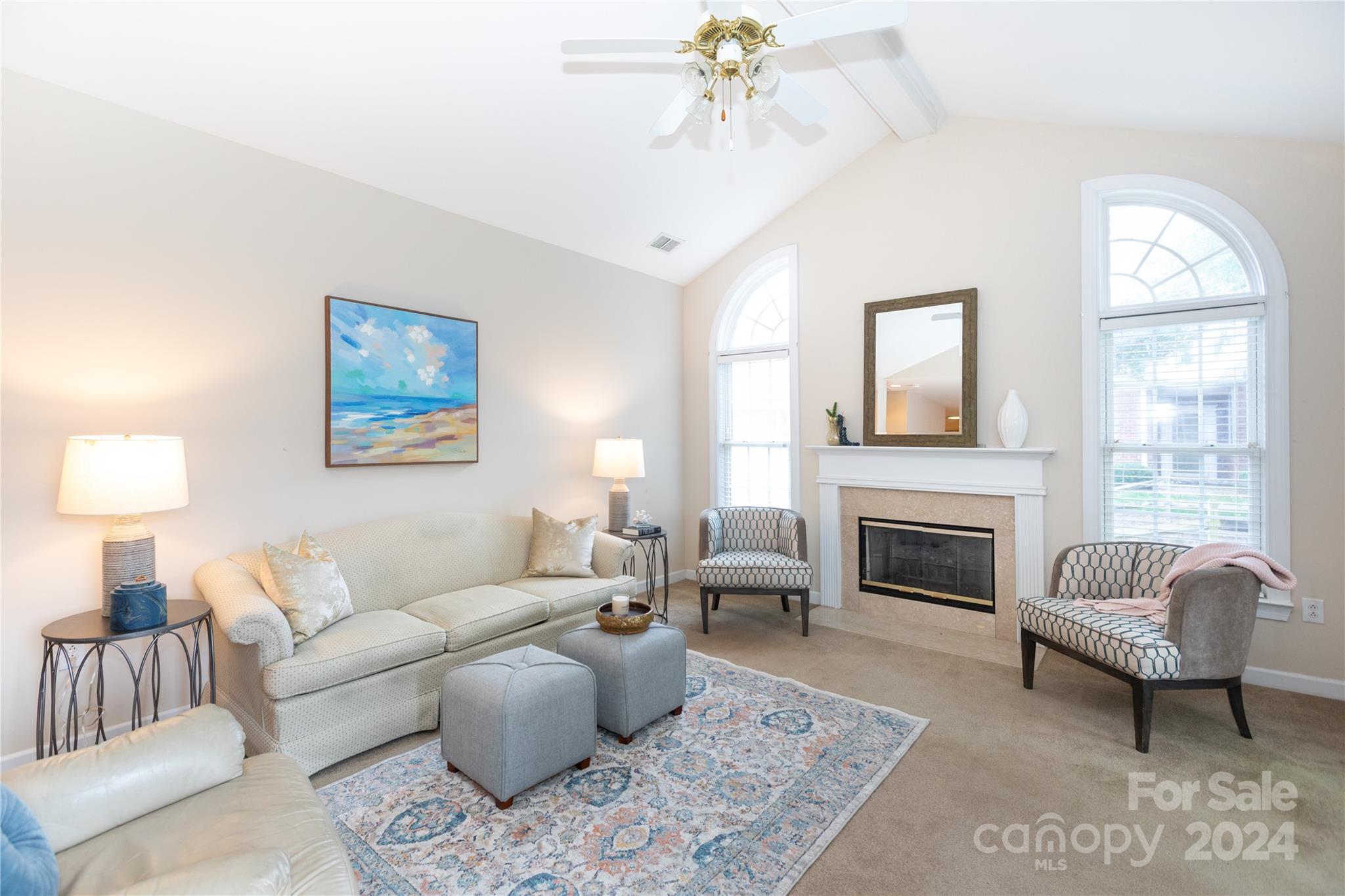8368 Windsor Ridge Drive Charlotte, NC 28277 - Photo 2 of 28 a living room with furniture and a fireplace
