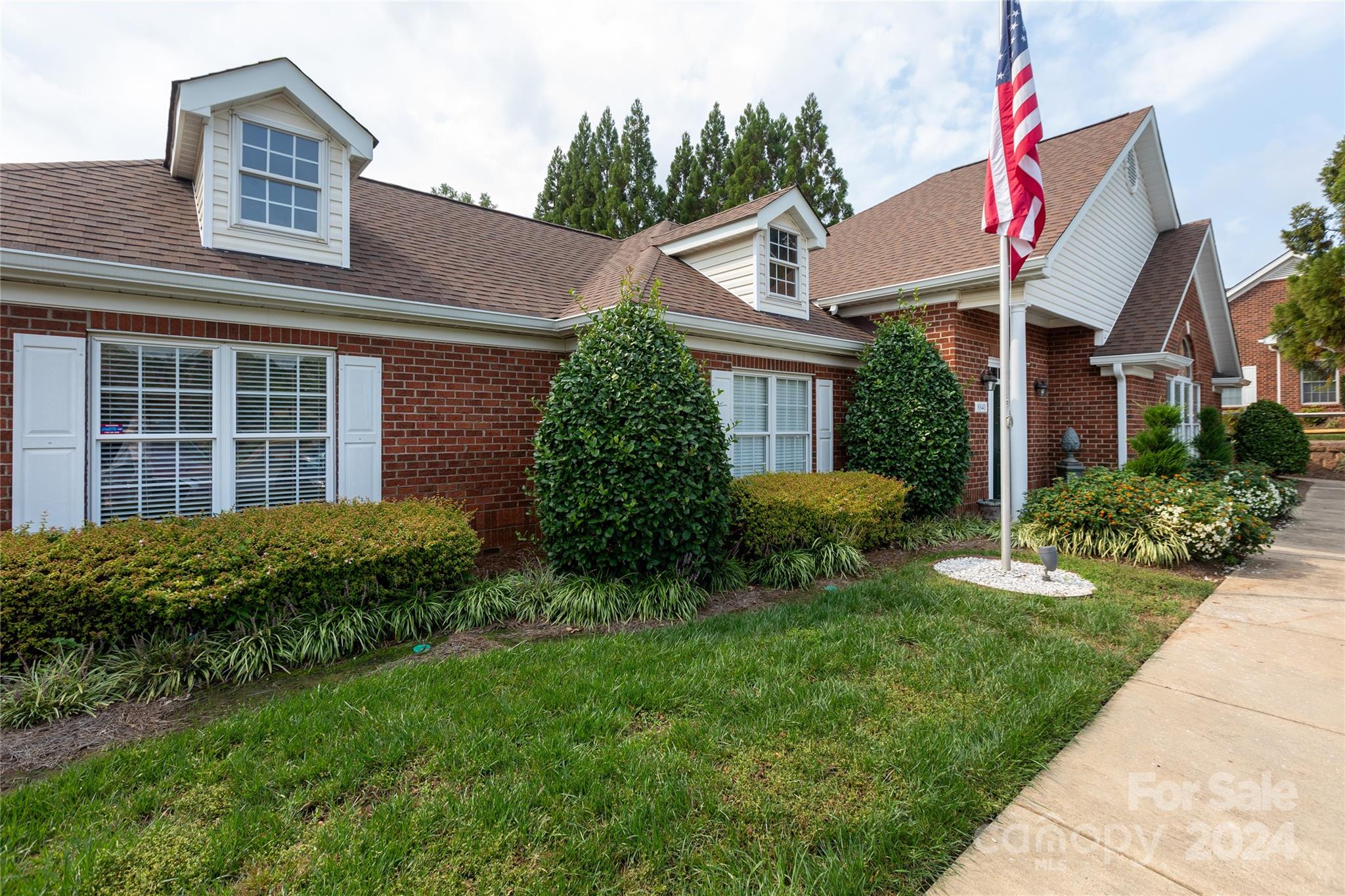 8368 Windsor Ridge Drive Charlotte, NC 28277 - Photo 28 of 28 a view of a house with a yard and plants
