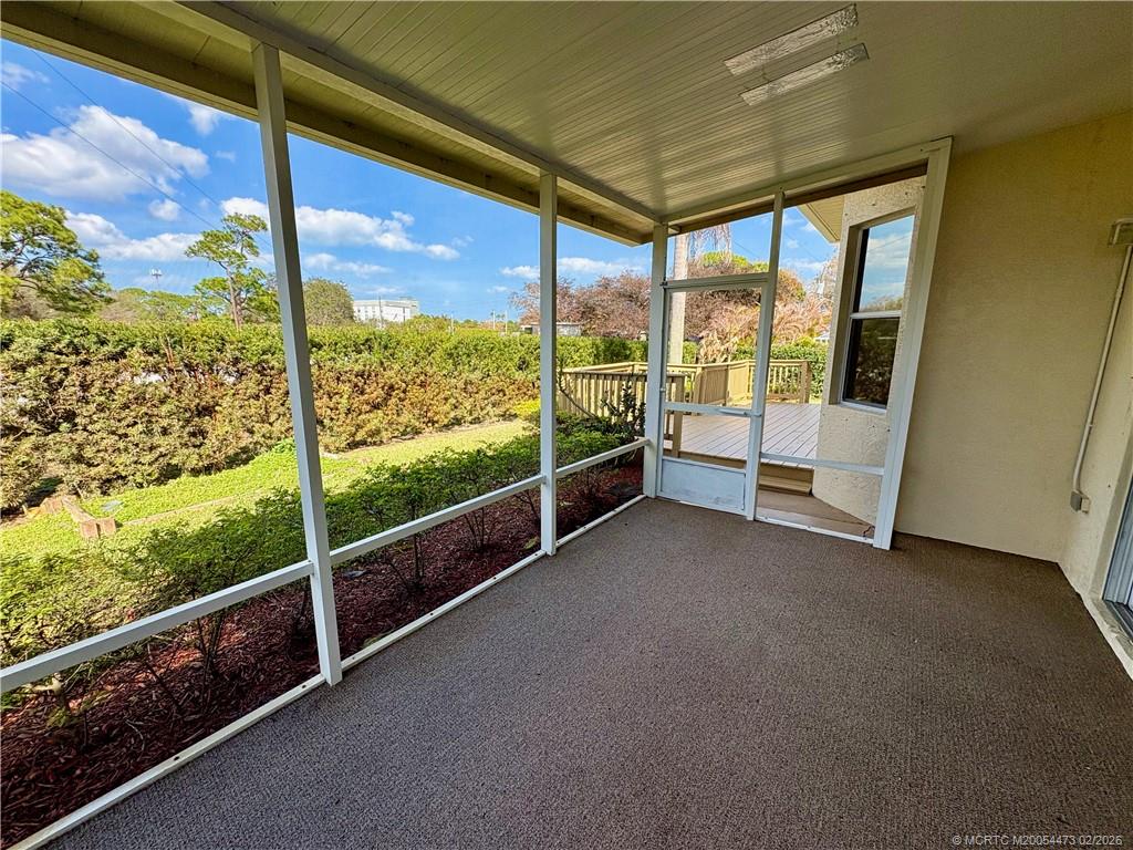 947 Northwest 13th Street Stuart, FL 34994 - Photo 16 of 23 a view of an empty room with a large window