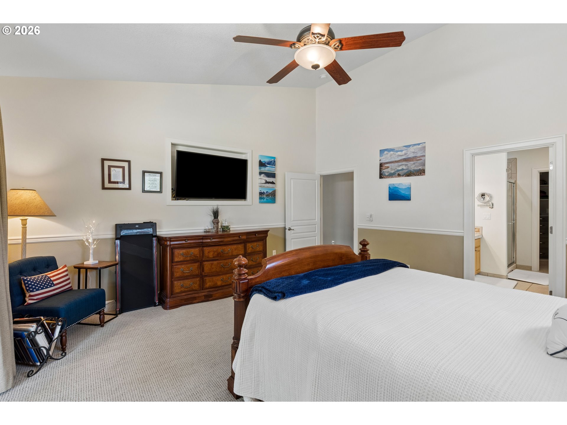 945 Northwest Angel Heights Road Stevenson, WA 98648 - Photo 19 of 41 a bedroom with a bed and a flat screen tv