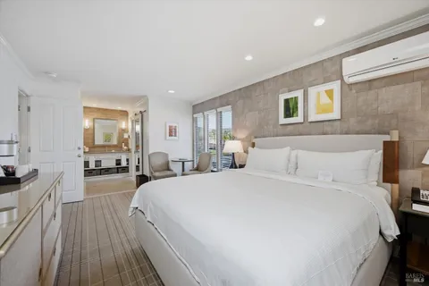 a bed room with a bed and a couch