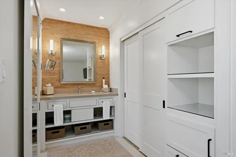 a view of a hallway with washer and dryer