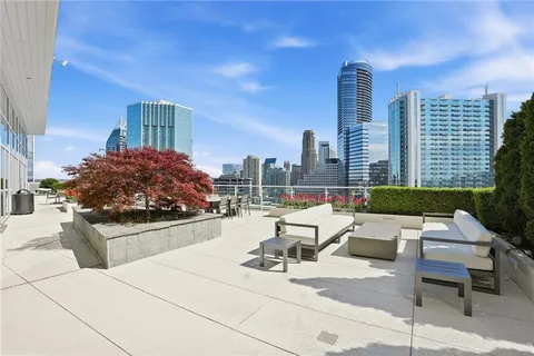 a outdoor space with lots of tables and chairs