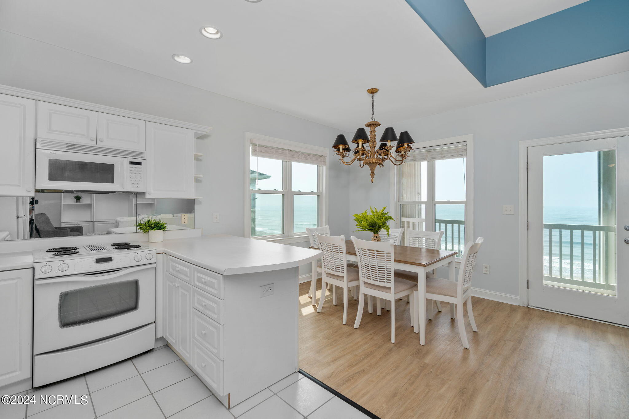 1701 Salter Path Road, Unit D301 Indian Beach, NC 28512 - Photo 14 of 60 Dining area and kitchen