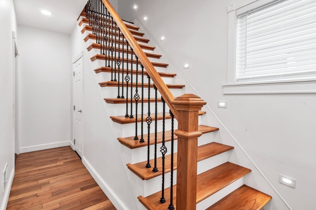 42 D Street Lowell, MA 01851 - Photo 7 of 27 a view of entryway with wooden floor
