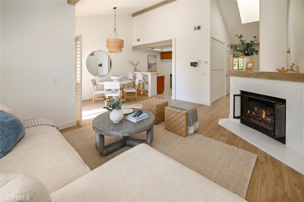 617 East Pine Avenue El Segundo, CA 90245 - Photo 14 of 31 a living room with furniture a table and a fireplace