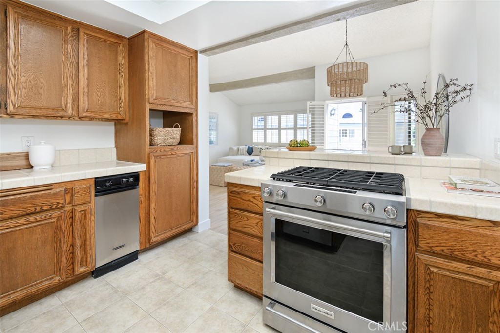 617 East Pine Avenue El Segundo, CA 90245 - Photo 20 of 31 a kitchen with stainless steel appliances granite countertop a stove and a sink