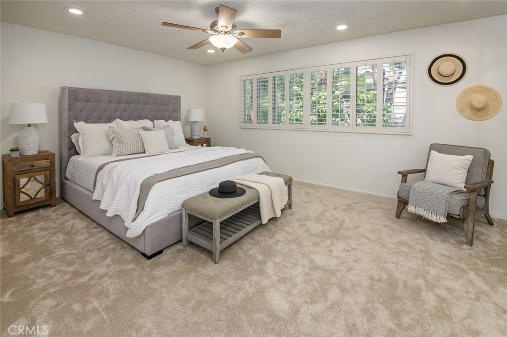 617 East Pine Avenue El Segundo, CA 90245 - Photo 23 of 31 a spacious bedroom with a bed and a window