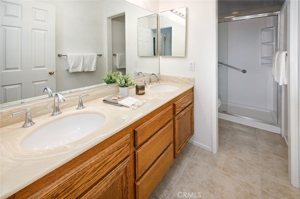 617 East Pine Avenue El Segundo, CA 90245 - Photo 26 of 31 a bathroom with a double vanity sink mirror and double