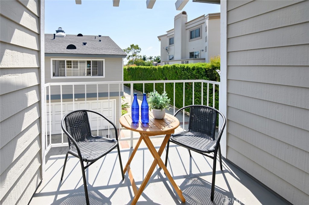 617 East Pine Avenue El Segundo, CA 90245 - Photo 29 of 31 a balcony view with a sink and chairs