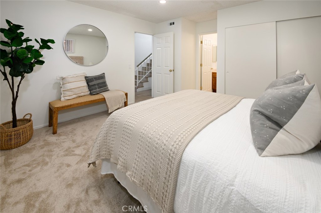 617 East Pine Avenue El Segundo, CA 90245 - Photo 10 of 31 a spacious bedroom with a bed and a potted plant