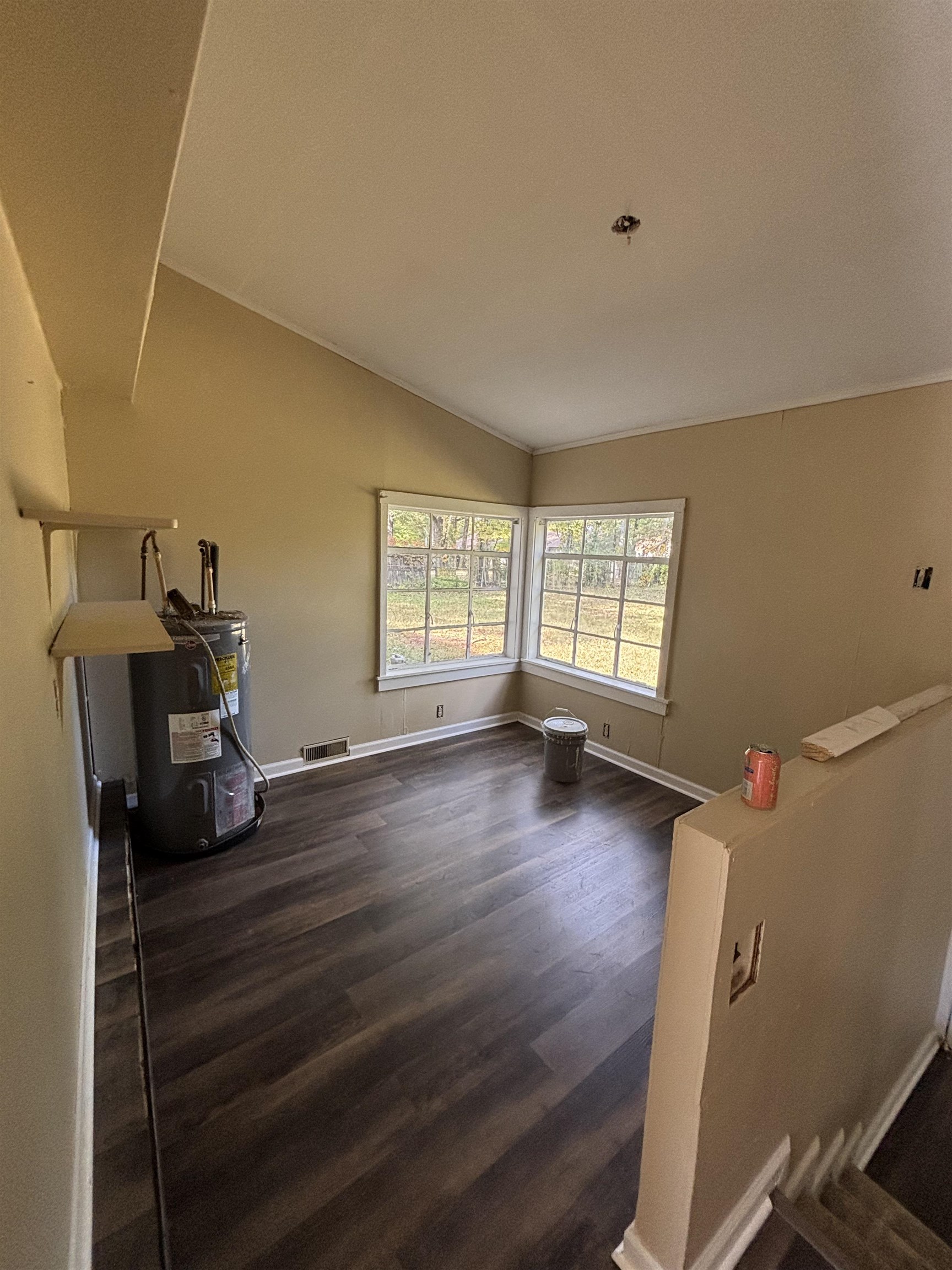 936 Brownlee Road Memphis, TN 38116 - Photo 4 of 12 a room with wooden floor and window