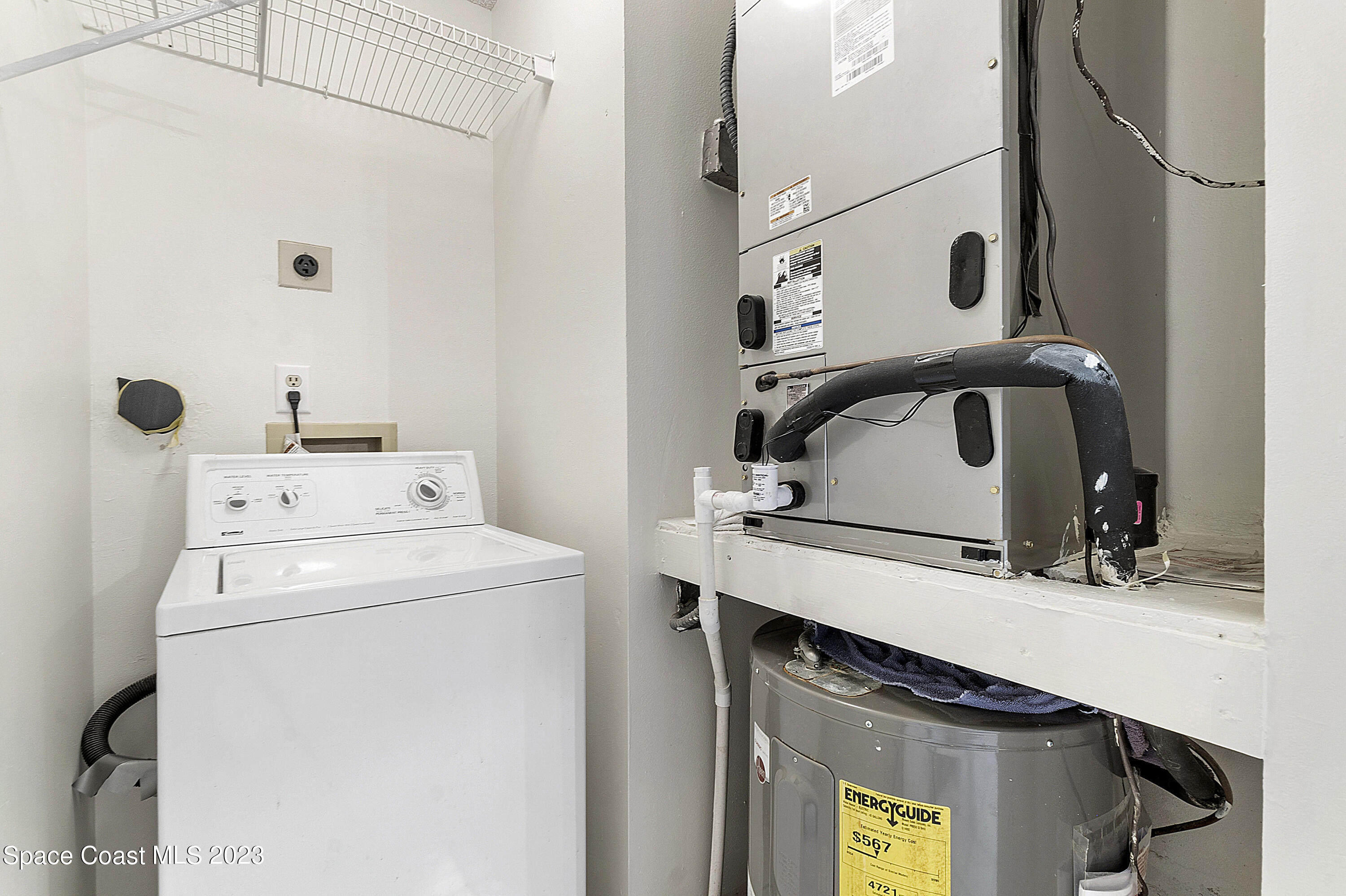 1720 Murrell Road, Unit 203 Rockledge, FL 32955 - Photo 13 of 13 a utility room with dryer and washer