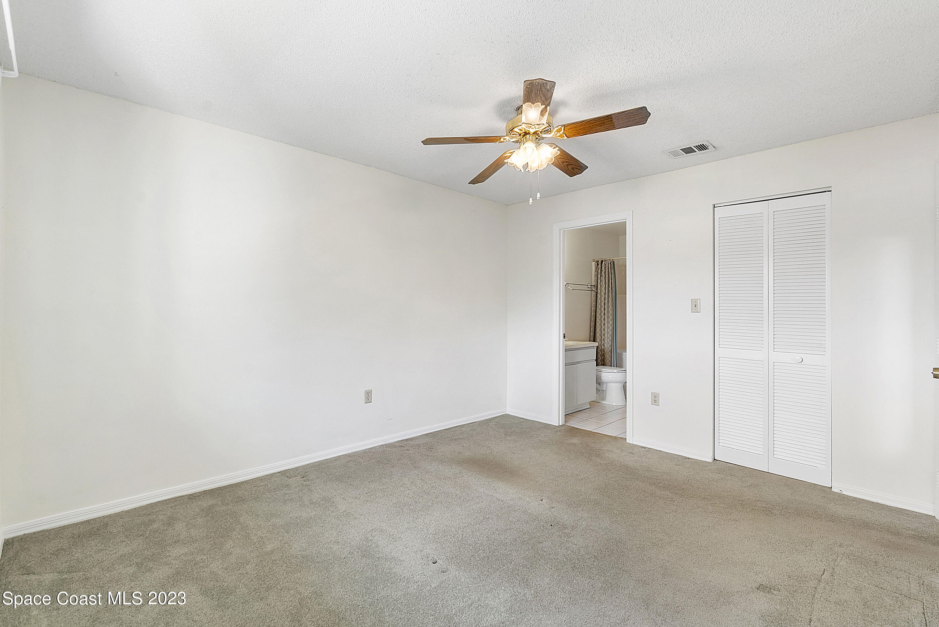 1720 Murrell Road, Unit 203 Rockledge, FL 32955 - Photo 6 of 13 a view of an empty room