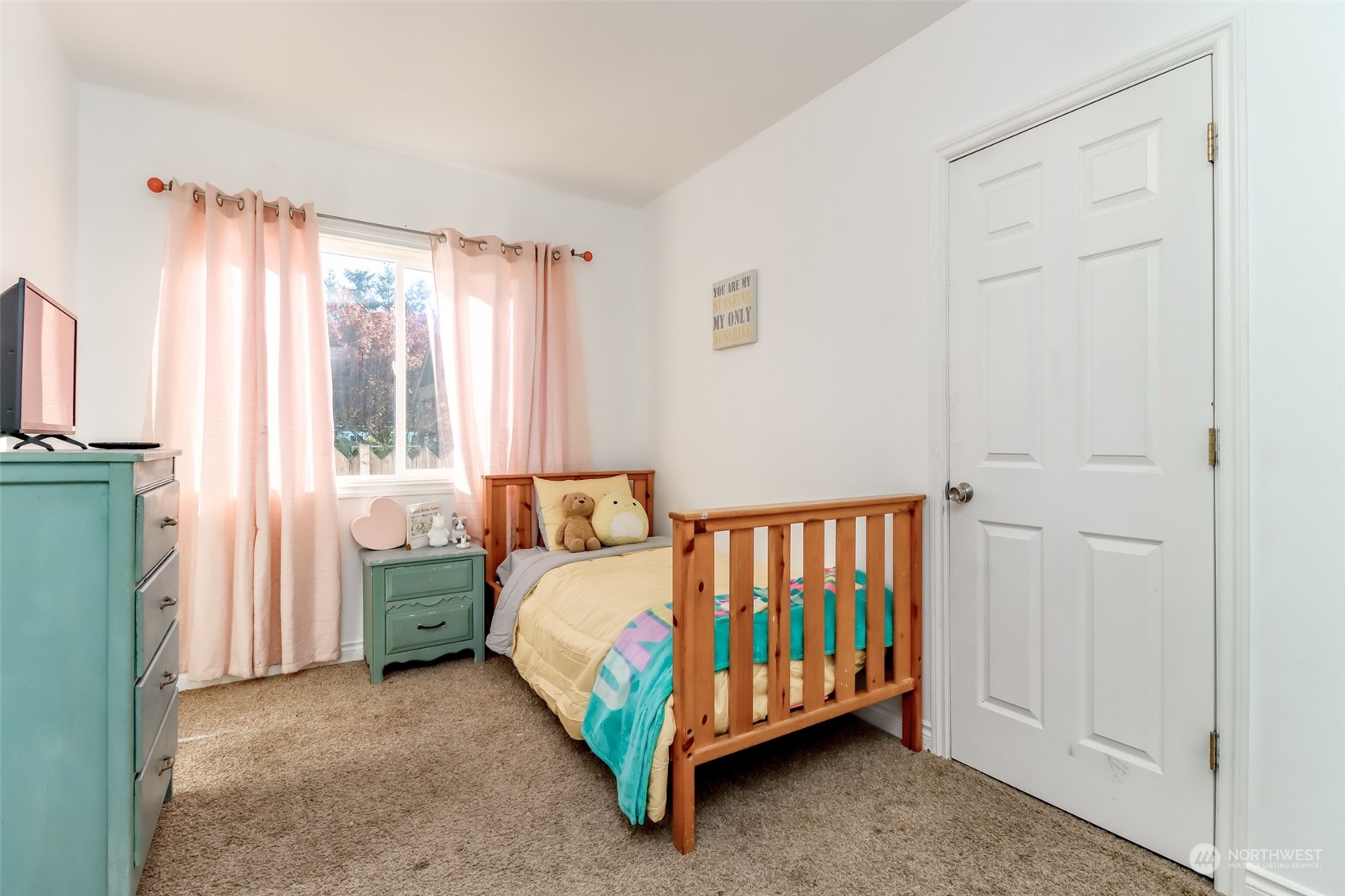 1355 McHugh Avenue Enumclaw, WA 98022 - Photo 18 of 35 a bed room with a bed and a window