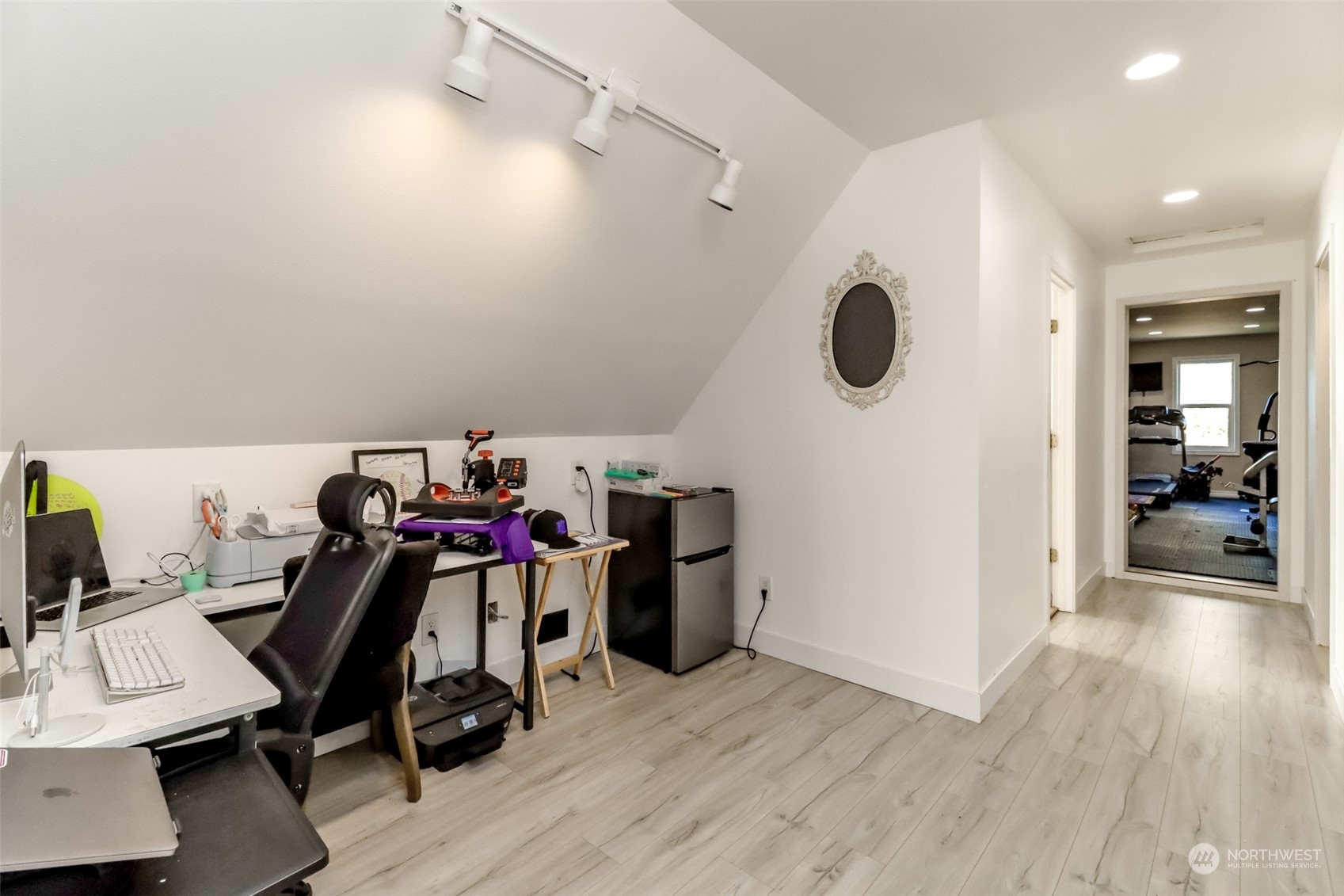 1355 McHugh Avenue Enumclaw, WA 98022 - Photo 27 of 35 a view of a workspace with furniture and wooden floor