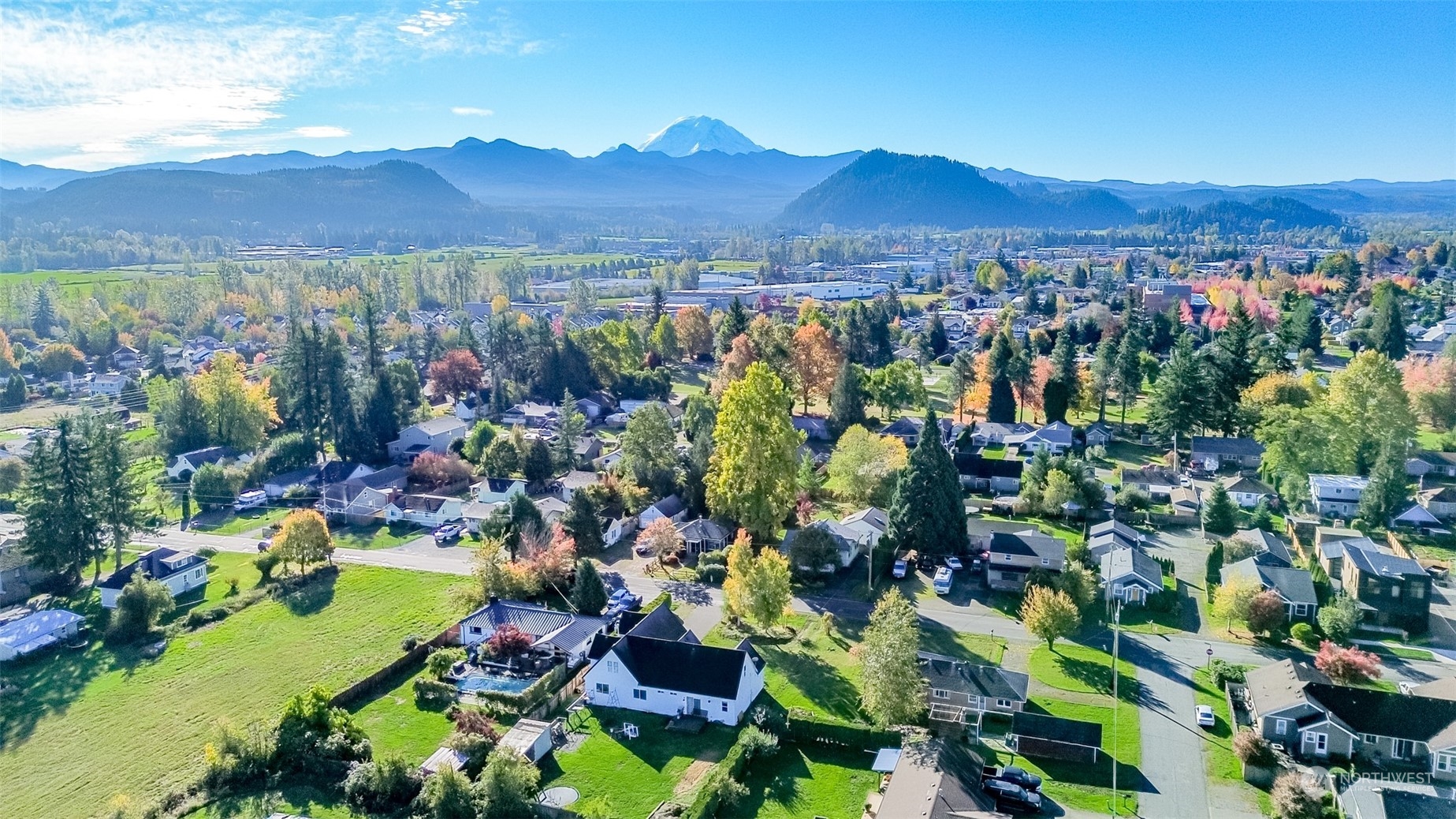 1355 McHugh Avenue Enumclaw, WA 98022 - Photo 35 of 35 a view of a city with mountains in the background